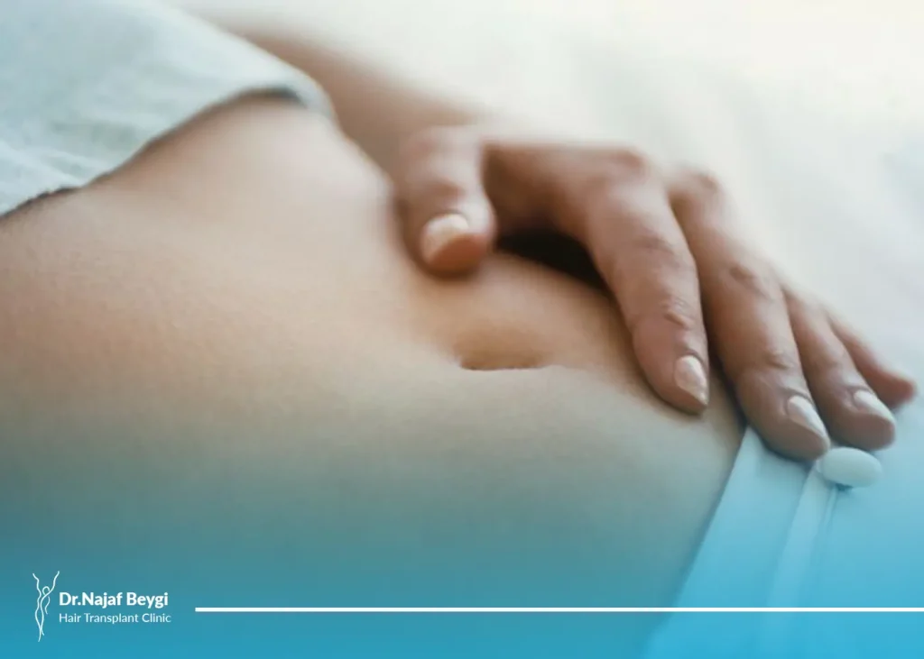 علت درد ناف بعد از عمل ابدومینوپلاستی چیست؟ + درمان آن